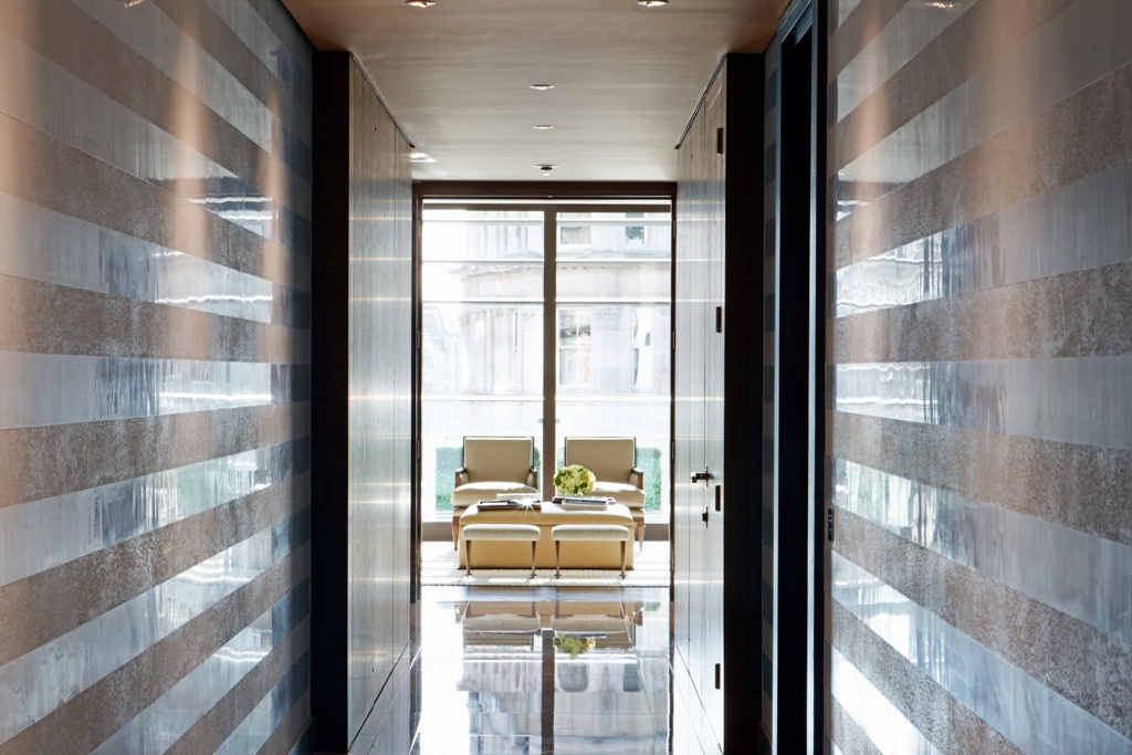 Armourcoat Spatulata polished plaster finish applied using banding technique to walls of luxury residential location