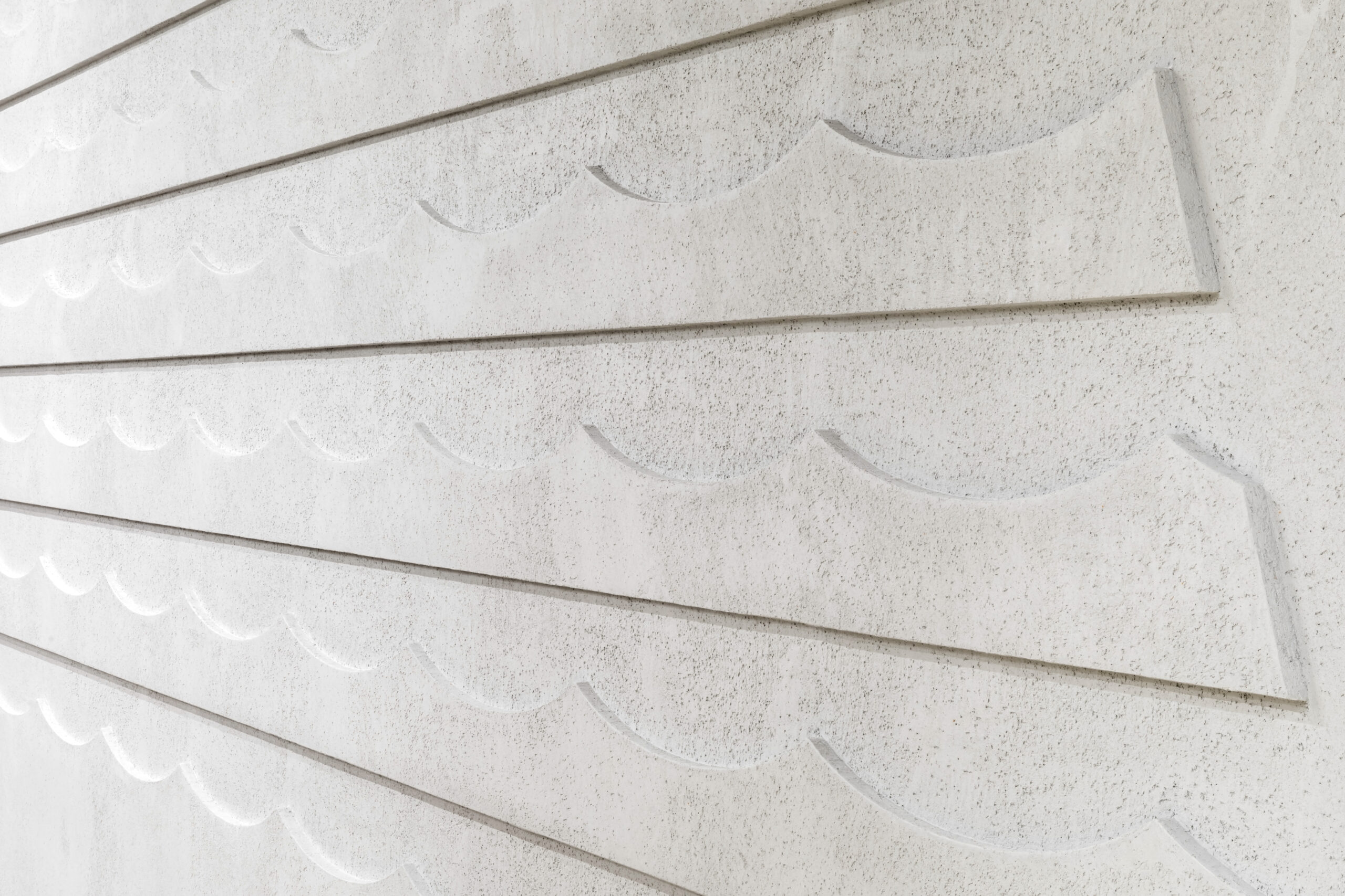 Detail of Armourcoat Sculptural Plaster Wall with Koncrete Textured Polished Plaster Finish used in commerical building, Core Five